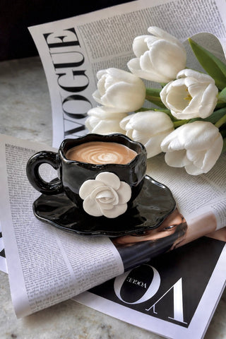 Camellia Romance Ceramic Tea/Coffee Cup Set of 2 on a marble dining table