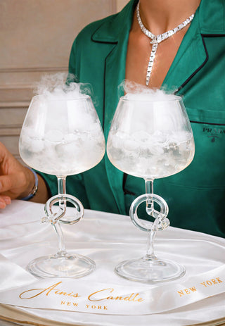 The Versailles Knot Glasses placed on a marble bar cart.