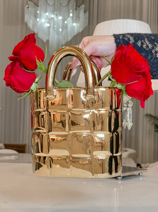 My Golden Purse Ceramic Vase atop a beautiful marble dining table.