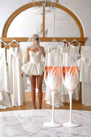 The Feather Bliss Champagne Flute displayed in a multi-million dollar mansions' bar.