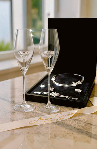 The ‘100-Carat’ Diamond Champagne Flute Set of 2™️ served in a high end art gallery.