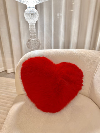 A Loving Heart Throw Pillow - 100% Lamb Fur on wool couch alternate angle 4.