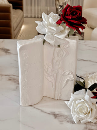 Ballerina Book Vase with white florals.