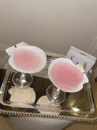 A close up shot of the Shelle Oceana Cup set of two with pink rose.