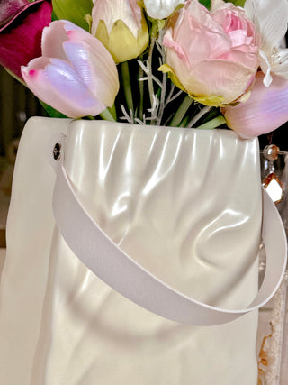 Aria 'Paper Bag' With Leather Strap Ceramic Vase close up details of glossy finish and leather strap.