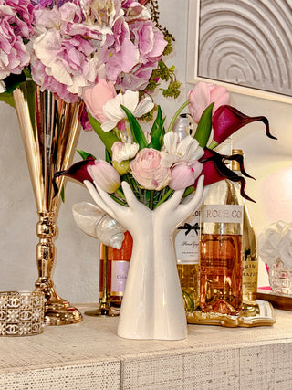 Luxurious Hand Ceramic Vase atop a luxurious, contemporary credenza.