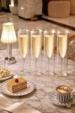 Maeve Double Layered Glass Cup Set of 4 used for coffee, tea, and espresso drinks.