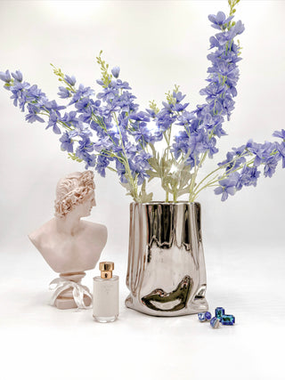 Luxe Bag Vase decorated with tall blue violet florals.