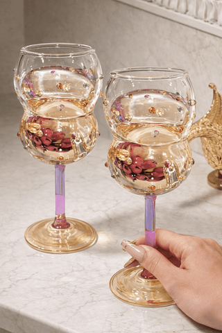 Luxurious Gemstones glass cup set featured in a high-end hotel lounge