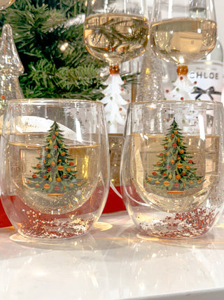 Christmas Confetti Glass Cup Set of 2 surrounded by wine.