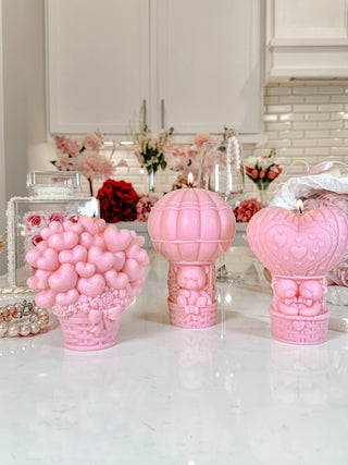 A close up photo of the Balloon Bear Candle in French Rose Pink Set of 3.