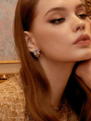 Rosemary Floral Yellow Sapphire Rhinestone Earrings worn by a model.
