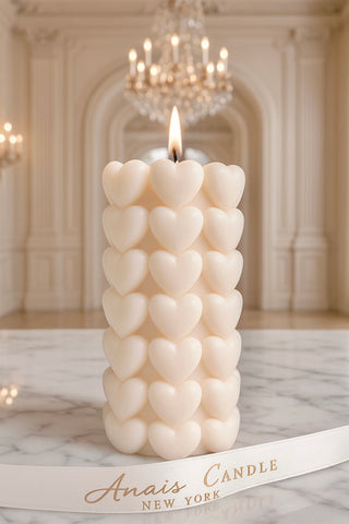 The Million Hearts Candle displayed in the hall of a modern, luxurious home.