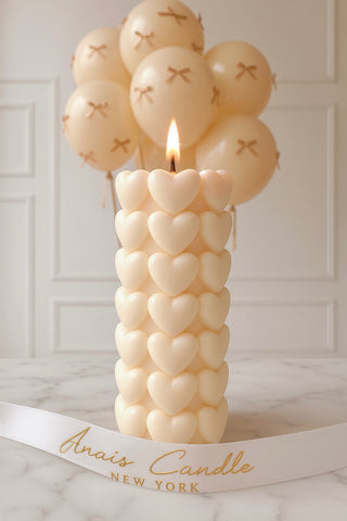 Million Hearts Candle is designed as a pillar candle of hearts.
