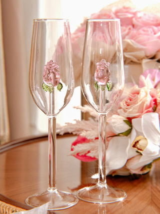 A La Vie En Rose Champagne Glass Set of 2 - Handcrafted atop a luxuriously gilded side table.