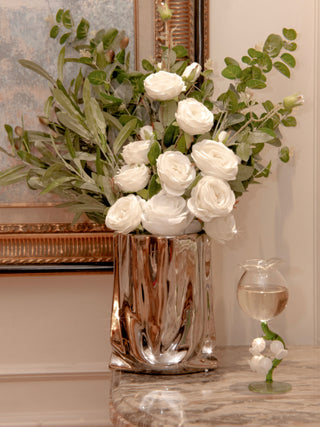 Luxe Bag Vase - Sliver Electroplated decorated with white roses and green florals.