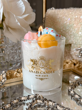 Macaron Parfait Candle on top of a golden mirror tray.