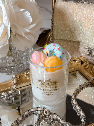 Macaron Parfait Candle placed on top of a golden mirror tray.