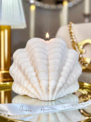 Modern Scallop Shell Candle - XXL on a gold tray with Anaïs ribbon.