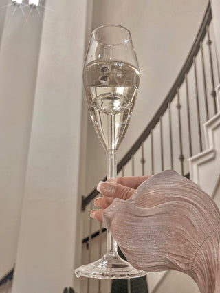 A ‘100-Carat’ Diamond Champagne Flute with a modern spiral stairway.