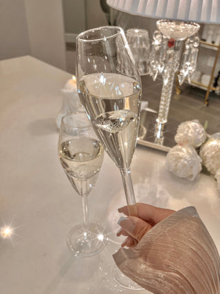‘100-Carat’ Diamond Champagne Flute Set of 2 with delicious champagne.