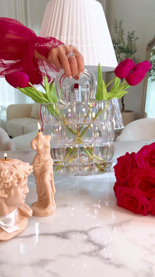 Camélia Padded Glass Handbag Vase in Rainbow video decorated with pink tulips.