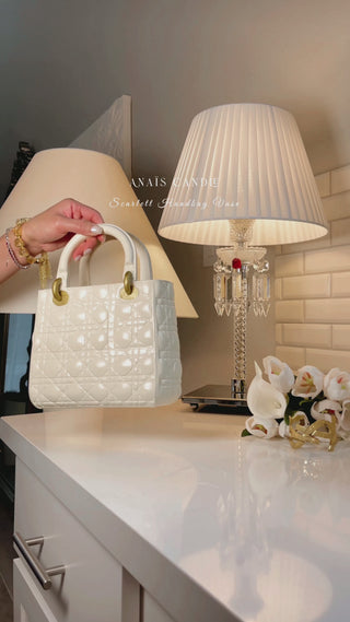 Scarlett Handbag Resin Vase in Beige promotional video.