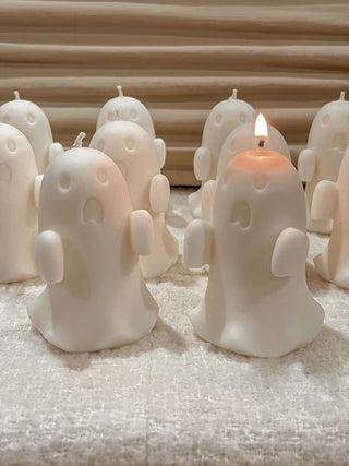 A bunch of Mini Ghost Candles next to each other.