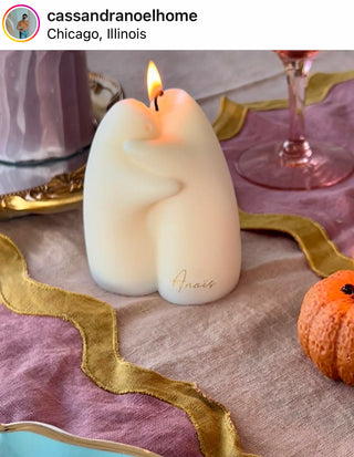 A lit Cuddle Ghosts Candle featured on Instagram.