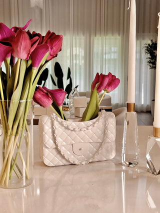 Anastasia Handbag Resin Vase in White decorated with pink tulips.