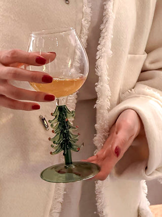 Christmas Tree Glass Cup - Handmade carefully held in a woman's hands.