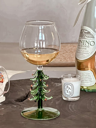 Christmas Tree Glass Cup - Handmade next to a candle and white wine.