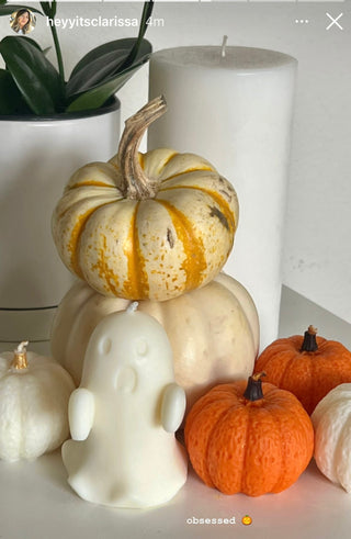 Mini Ghost Candle next to Anais pumpkin candles, featured on Instagram.