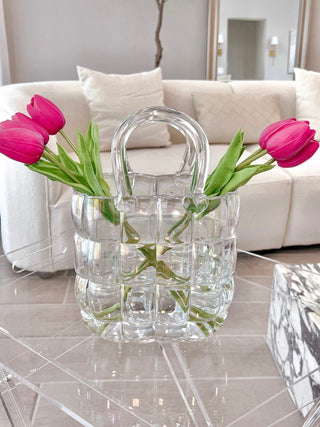 Camélia Padded Glass Handbag Vase in Rainbow with decorated with pink tulips.